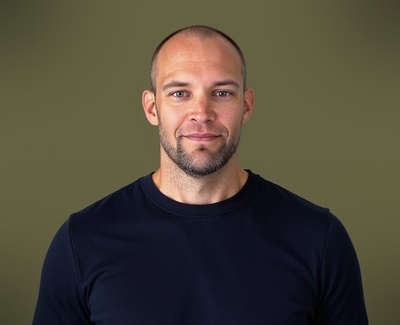 Professional AI headshot example created by HeadshotPro - male business portrait